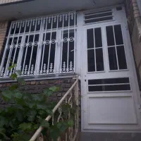 فروش یک درب و یک پنجره آهنی نوباقوطی