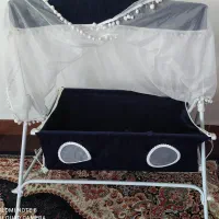 گهواره با پشه بند