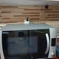 ماکروویوو ۳۰ لیتری فلر اصل نو دفترچه راهنما فارسی
