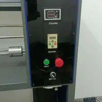دستگاه رول سفره زباله و کیسه فریزر