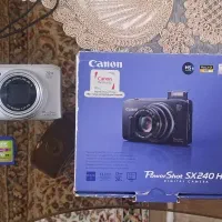 دوربین عکاسی canon مدل sx240hs به همراه سه پایه نو