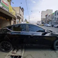 شیشه دودی اریزو ، جک و پژو ۲۰۷ و روکش صندلی