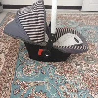 آغوشی  ساک بچه  کریر  پشه بند  درحد نو