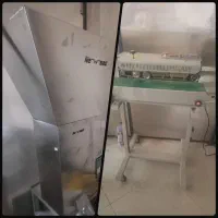 دستگاه پرکن توزین دار گرانولی و دستگاه دوخت ریلی