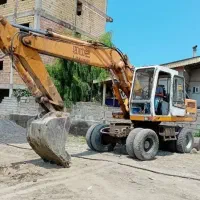 کار بیل مکانیکی لاستیکی