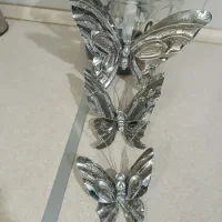 دیوارکوب و مجسمه