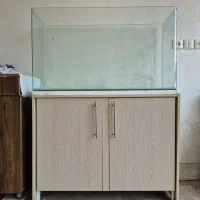 آکواریوم شیشه خم شرکتی بهمراه میز ام دی اف