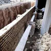 انجام کار دیوار چینی پلاستر و شیب بندی ساختمان