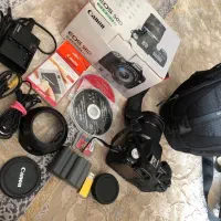 کیف و پایه دوربین و خود دوربین