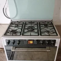 اجاق گاز فردار صحفه استیل فن دار زمان دار سالم