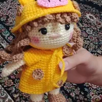 عروسک دختر کلاه زرافه ای