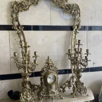 فروشنده وخریدار اینه شمعدان برنزی قدیمی