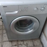 ماشین لباسشویی تمام اتوماتیک نقره ای