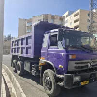 راننده پایه یک کامیون کمپرسی