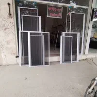 توری آلومینیومی  و درب و پنجره آلومینیوم