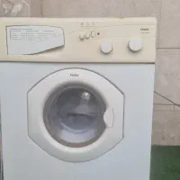 لباسشویی و میز جلو مبلی در حد نو..