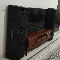 باند،اسپیکر،ایستاده کنار تلویزیونی مناسب جهیزیه