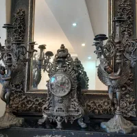 آینه شمعدان و ساعت