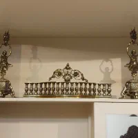 گارد برنجی شومینه و مجسمه های برنجی