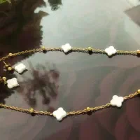 گردنبند .دستبند.گوشواره ‌استیل کار با مرواریدوصدف