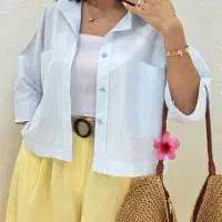 خیاط و جا دکمه زن