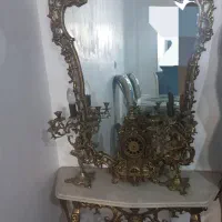 آیینه و شمعدان وساعت