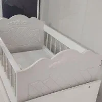 تخت گهواره‌ای کودک