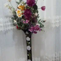 گل همراه با گلدان