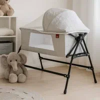 گهواره تاشو تاتلی رنگ طوسی کرم ۲/۵۰۰