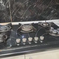 گاز صفحه ای رو میزی تو کار شیشه ای مشکی