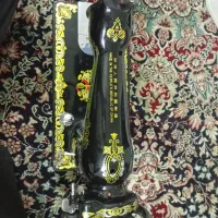 چرخ خیاطی مرد پرنده