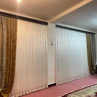 شستن و اتوی پرده