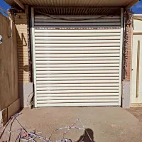 درب کرکره برقی و شیشه سکوریت