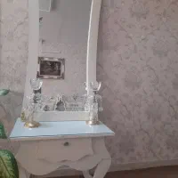 گلدان و آینه و شمعدان