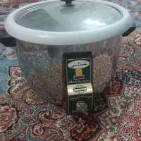 پلو پز برقی ۱۲ نفره در حد نو بسیار سالم بدون ایراد
