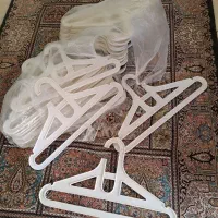 چوبکار چوب لباسی سفید آویز لباس