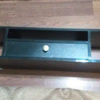 میز تلویزیون مشکی دیواری سه کشو