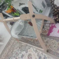 گهواره چوبی چرخان