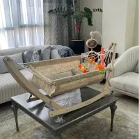 تخت نوزادی با آویز جذاب