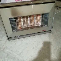 بخاری دیواری با لوله دودکش و..