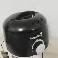 موم گرم کن