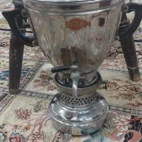 سماور نفتی قدیمی و تلوزیون قدیمی