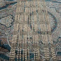 پرده تزیینی با مهرهای چوبی