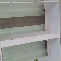ویترین دوطرفه بدون شیشه
