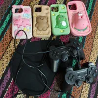 دسته سونی ۲ و قاب آیفون و زیر موسی