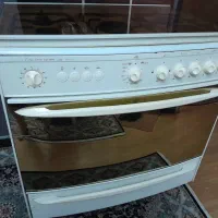 گاز تاکنو لعابی ۵ شعله تمیز و سالم در حد نو