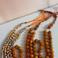 چهار تا تسبیح کهربا بودار .