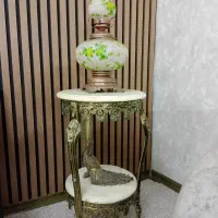 فروش سه پایه سنگی و چراغ و طاووس برنزی