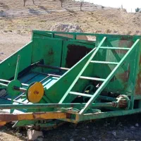 دروگر گندم پشت تراکتوری
