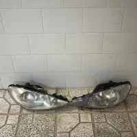 فروش جفت چراغ جلو ۲۰۶ و کیت مکش خودرو در حد نو